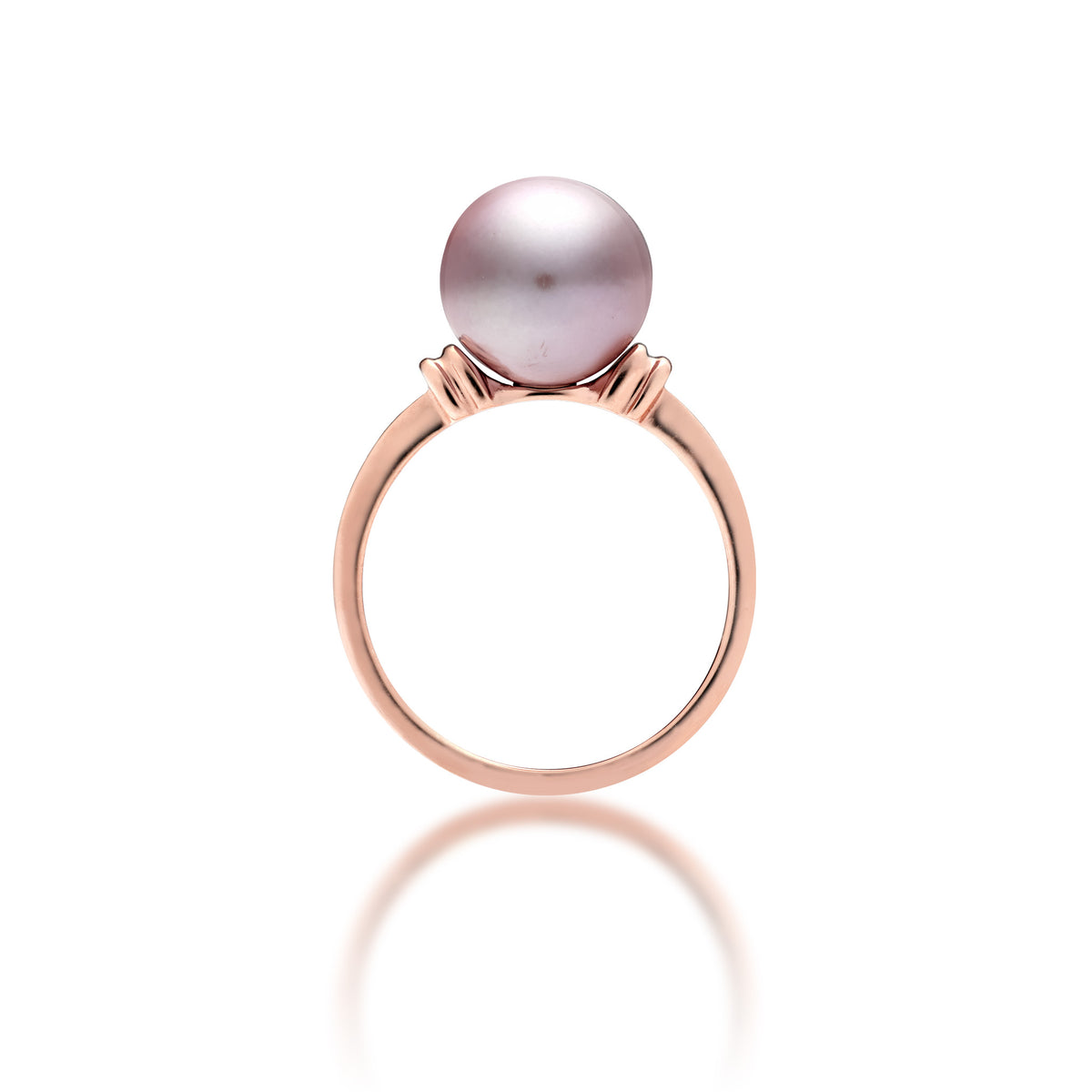 Profile view of a 14k rose gold ring with a lilac freshwater pearl and raised divot accents in rose gold on each side of the pearl, shown on a white background