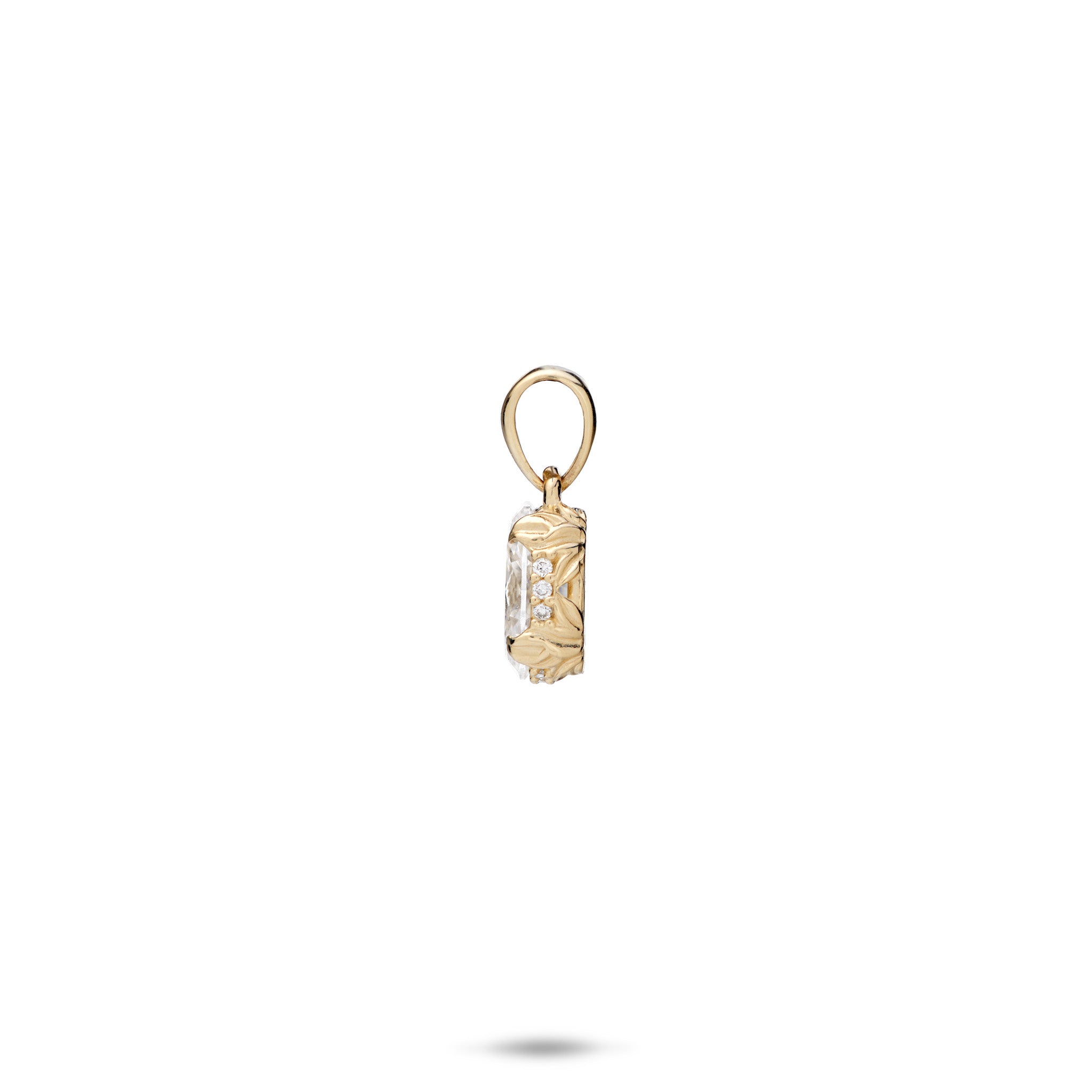 Side view of a Hidden Hawaiʻi Maile Lab Grown Diamond Pendant in Gold on white background