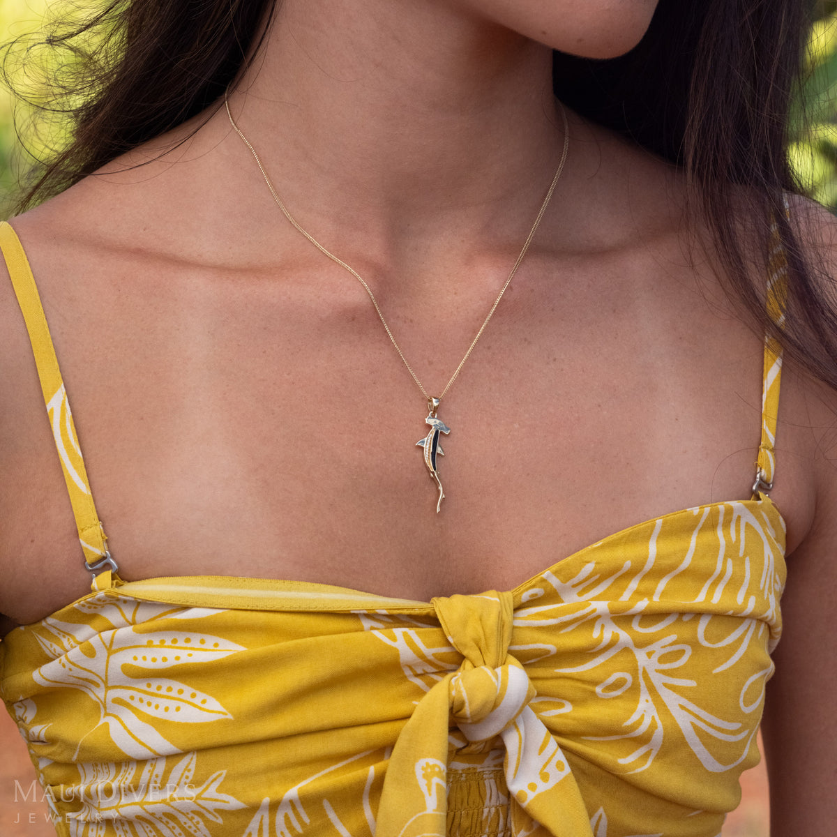 Close-up of 14k Gold Hammerhead Necklace with rare Black Coral and Natural Diamonds.