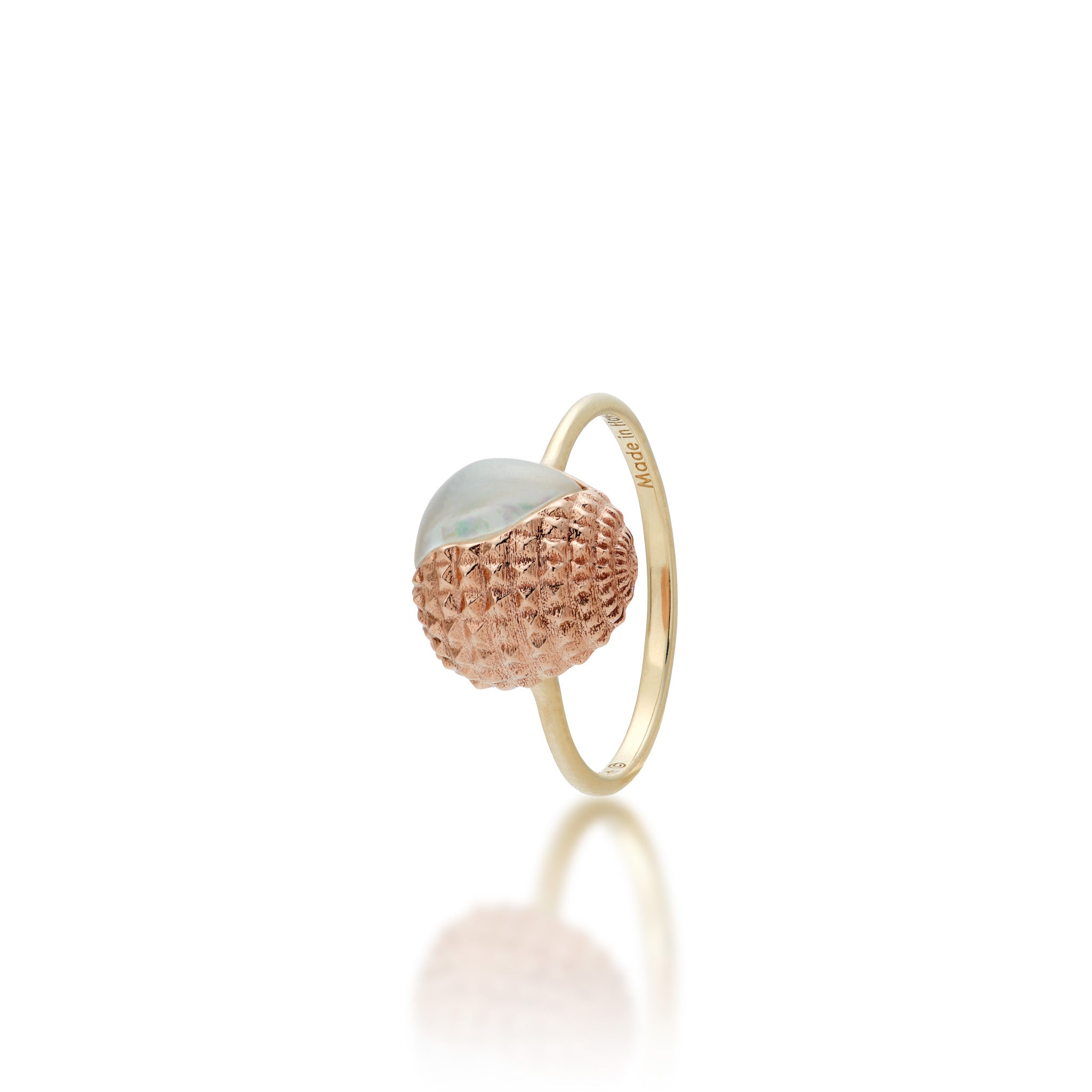 Angled View of the 11mm Lychee Ring in 14k Rose and Yellow Gold with White Mother of Pearl Inlay on a White Background