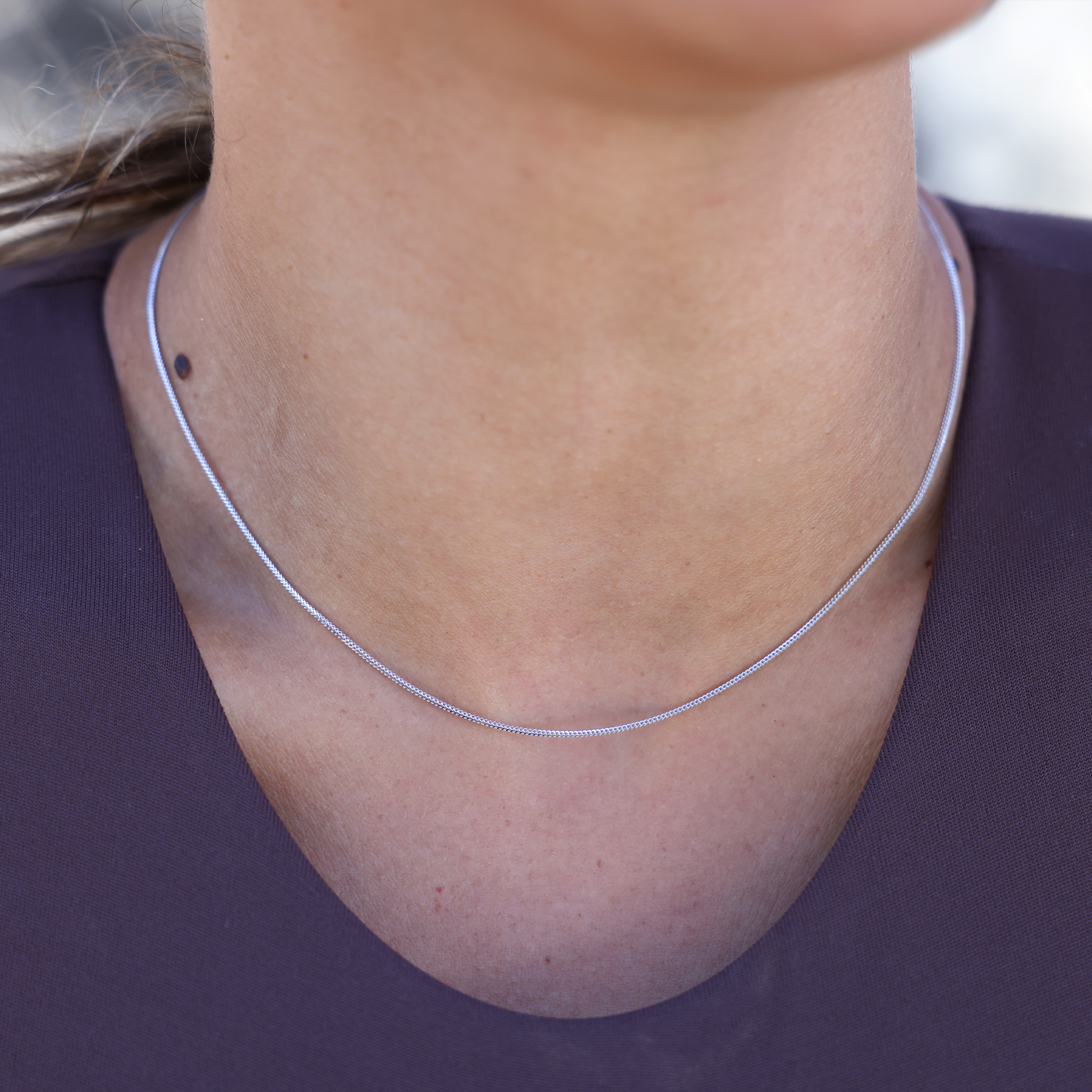 ホワイトゴールドの1.2mmシンガポールフォクステールチェーン