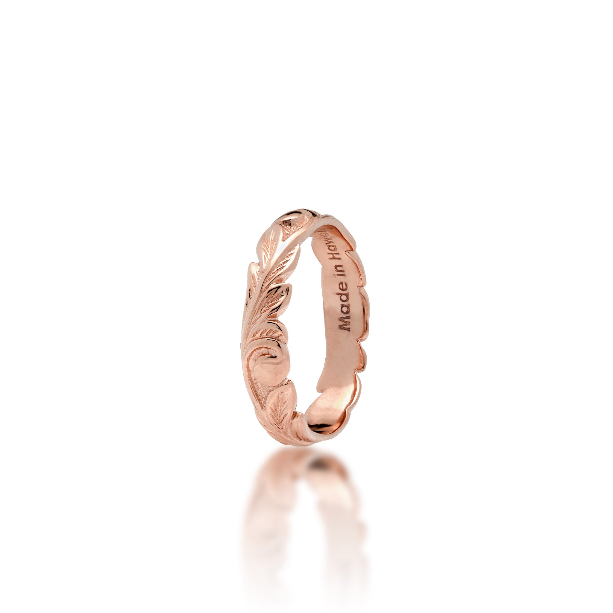 4.5mm Hawaiian Heirloom Ring in 14k Rose Gold with maile leaf and fern scrollwork and ʻMade in Hawaiiʻ stamp, shown on a white background