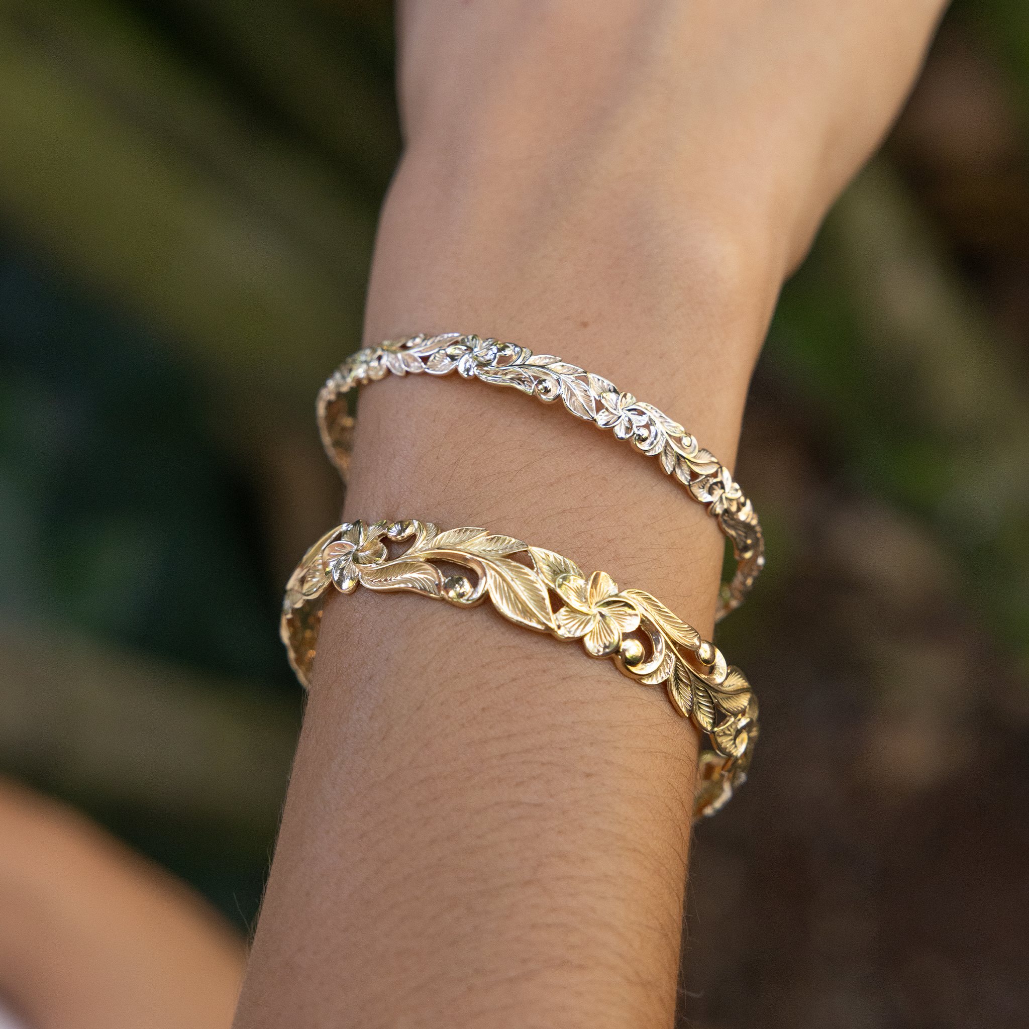 6mm and 10mm Hawaiian Heirloom Plumeria Bracelet in Gold on wrist