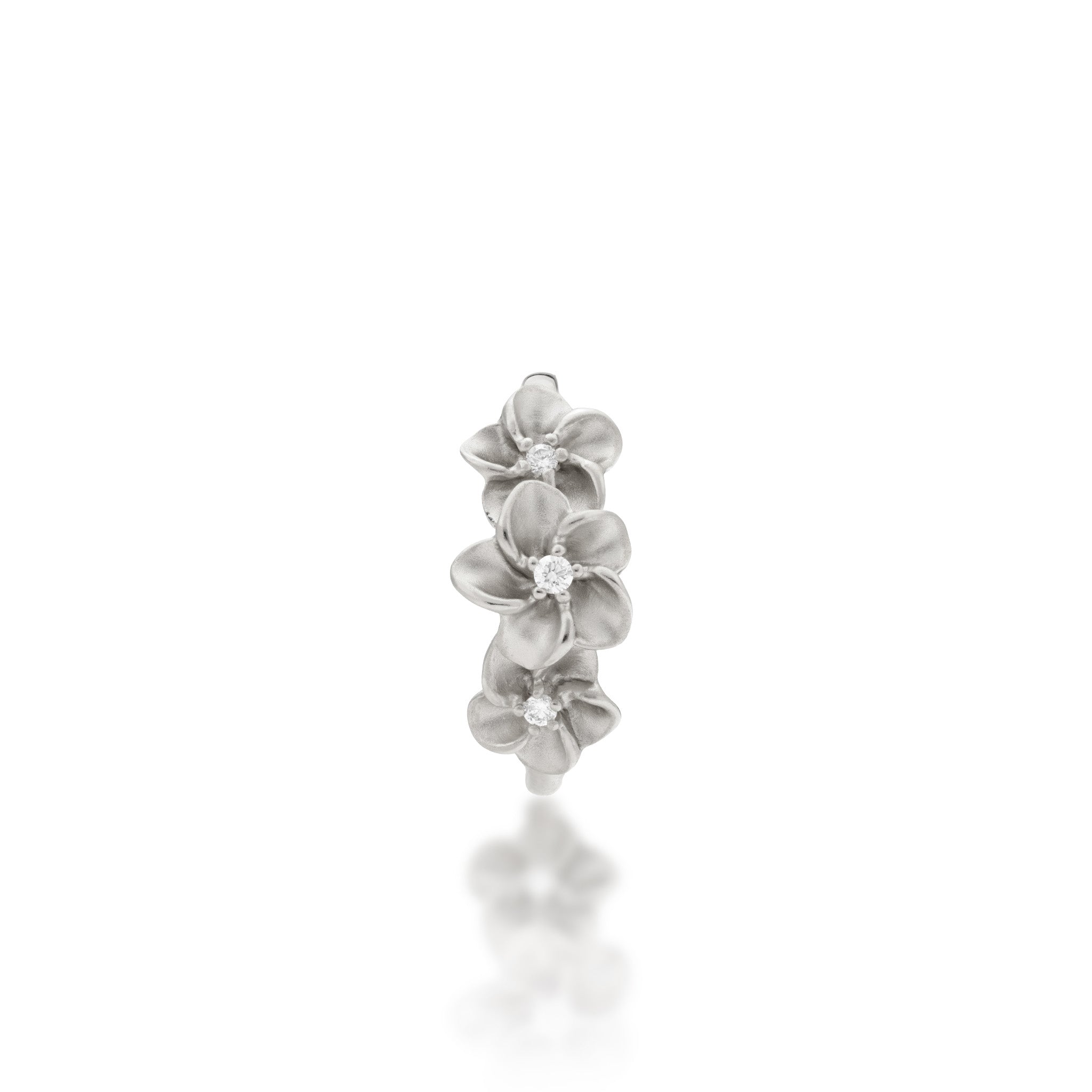 Top view of the 8mm Plumeria Ring in White Gold with Diamonds on a white background