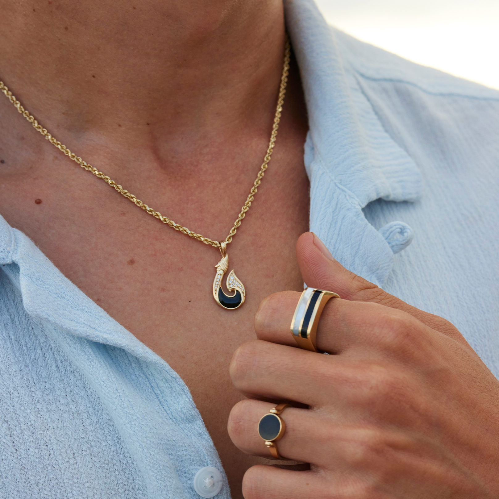 2.5mm Rope Chain in 14k Yellow Gold with hook pendant on man's chest
