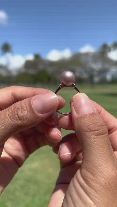video of a woman's hands wearing a Lilac Freshwater Pearl Ring in 14K Rose Gold - Maui Divers Jewelry