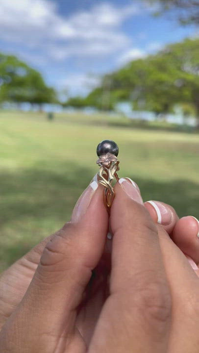 Video of a woman's hand wearing a Sealife Seahorse Black Coral Ring in Gold with Diamonds - 15mm - Maui Divers Jewelry