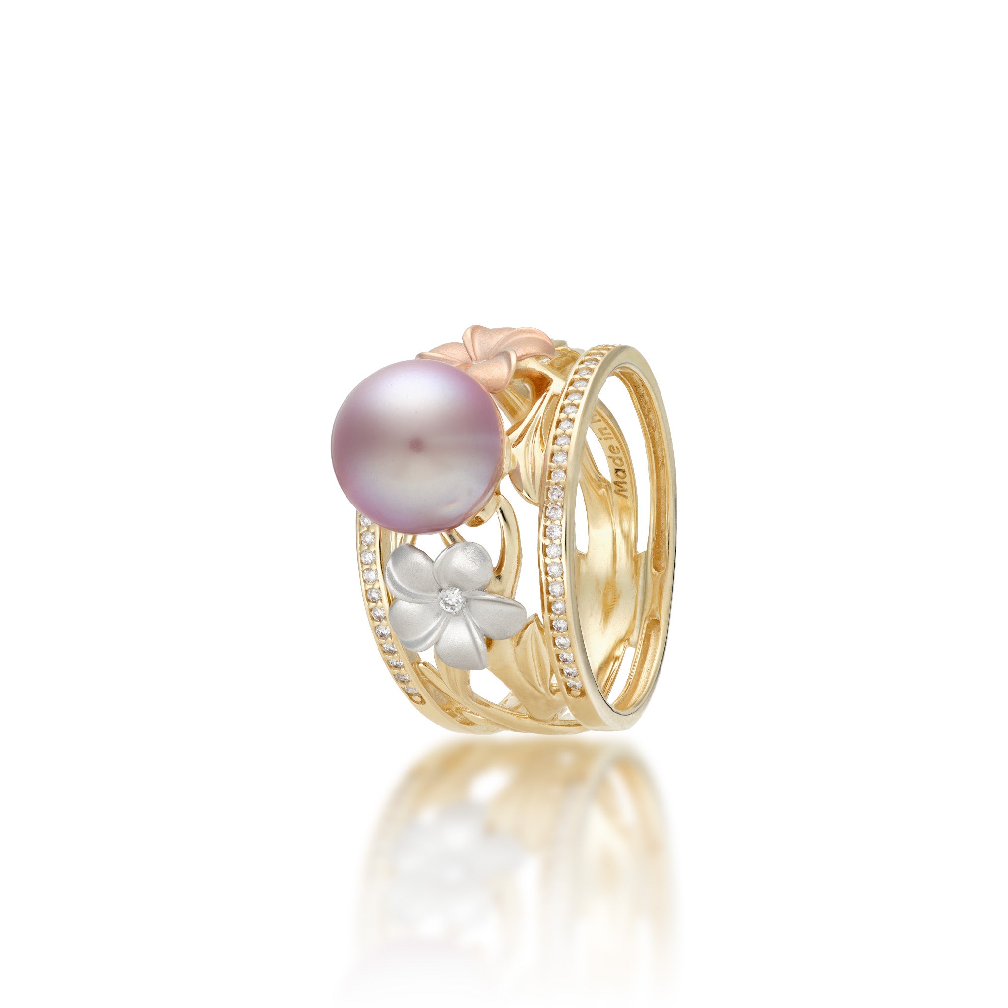 Angle view of the 12mm Pearls in Bloom Plumeria Lavender Freshwater Pearl Ring in Tri Color Gold with Diamonds on a white background