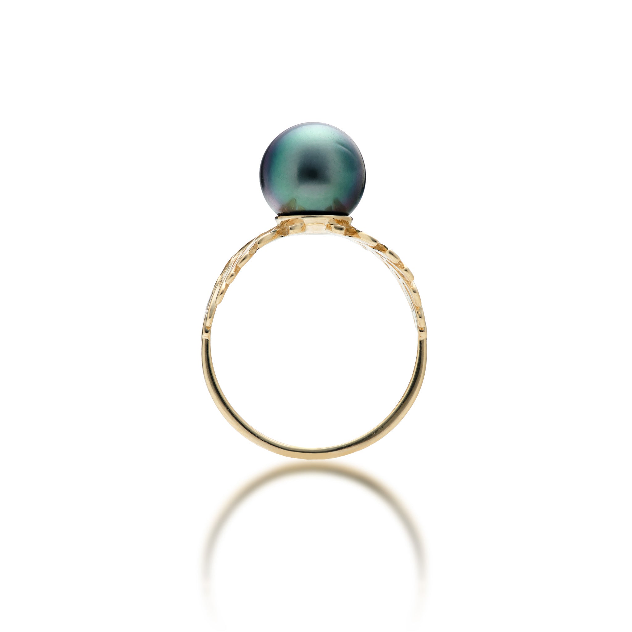 Side view of the Monstera Tahitian Black Pearl Ring in 14k Yellow Gold on a White Background