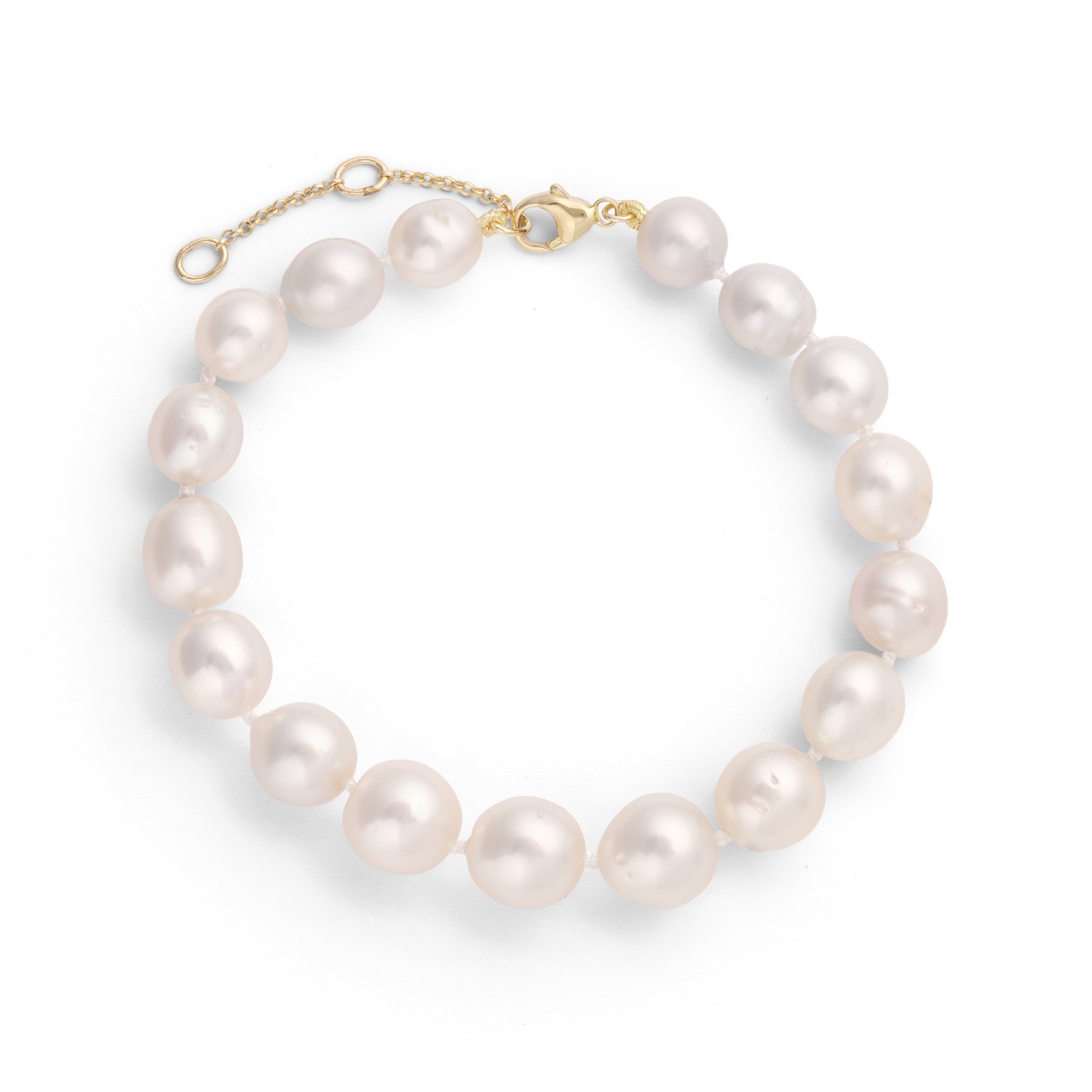 Top down view of an 8-9.5" Adjustable 9-13mm South Sea Silver and White Pearl Bracelet in Gold on a white background