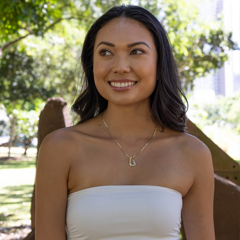Smiling woman wearing Fish Hook Pendant in Gold - 24mm