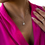 A woman wearing a Honu Pendant in Gold with Diamonds - 13mm-Maui Divers Jewelry