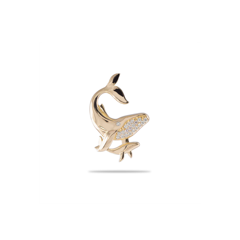 A woman's chest with an Ocean Dance Humpback Whale Mother & Baby Pendant in Gold with Diamonds - 24mm - Maui Divers Jewelry
