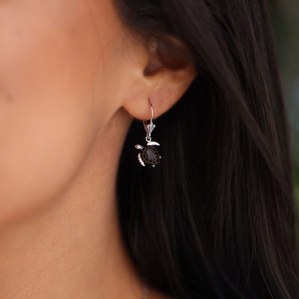 close up of woman wearing Honu Black Coral Earrings in White Gold - 12mm