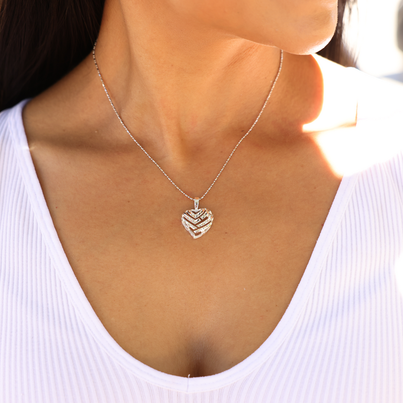 Aloha Heart Pendant in Sterling Silver - 18mm on Model Chest with White Shirt