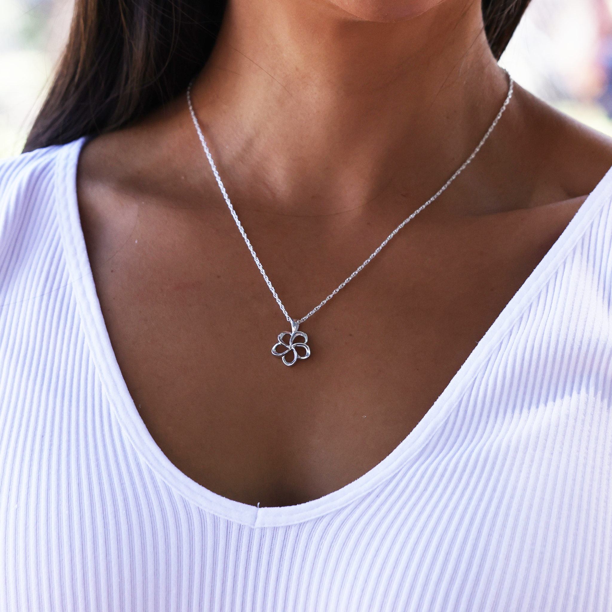 18" Plumeria Pendant in Sterling Silver - 15mm  on model - Maui Divers Jewelry