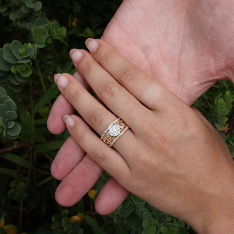A woman's hand wearing a Living Heirloom Engagement Ring in Gold with Diamonds - 10mm - Maui Divers Jewelry