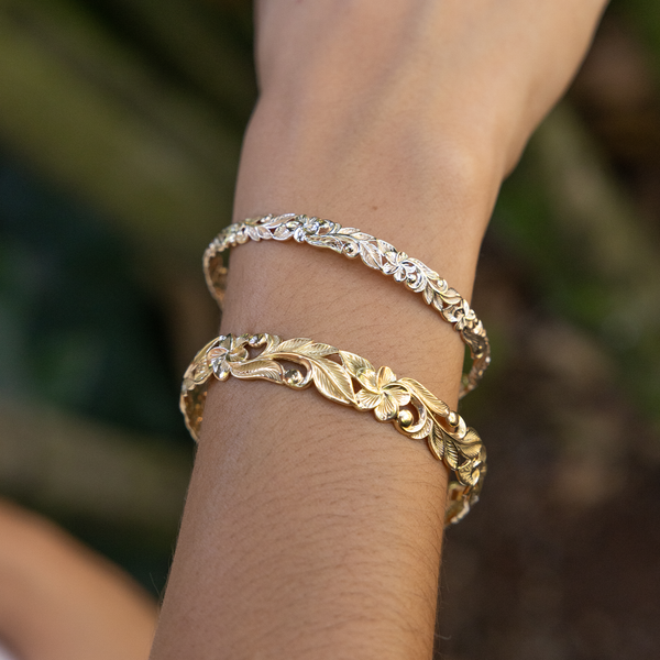 6mm and 10mm Hawaiian Heirloom Plumeria Bracelet in Gold on wrist