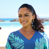 A woman wearing Nalu Heart Earrings in Gold with Diamonds - 15mm and Nalu Heart Pendant - Maui Divers Jewelry