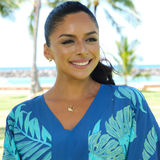 A woman wearing Ocean Dance Manta Ray Earrings in Gold with Diamonds - 19mm - Maui Divers Jewelry
