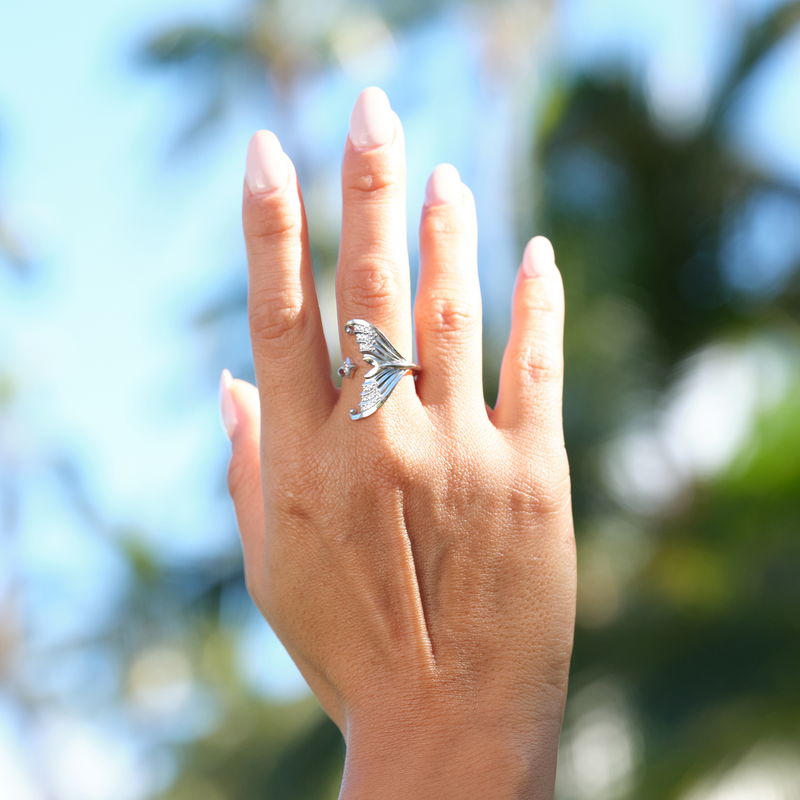 A woman's hand wearing a Moon Mermaid Ring in White Gold with Diamonds - Maui Divers Jewelry