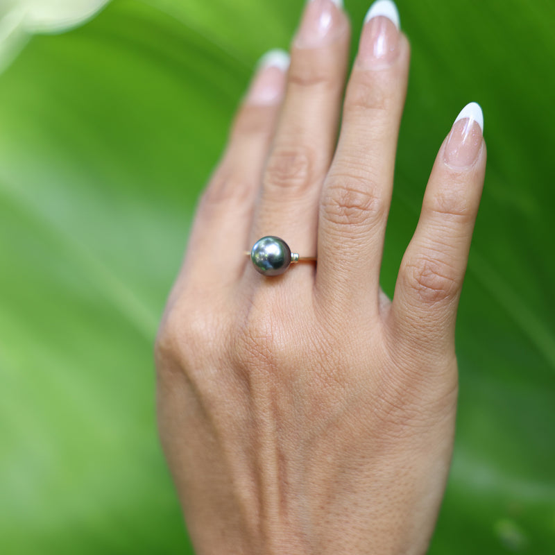 Tahitian Black Pearl Ring in Gold - 9-10mm on Hand with leaf background