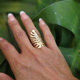 Close up of woman wearing Monstera Ring in Gold - 30mm