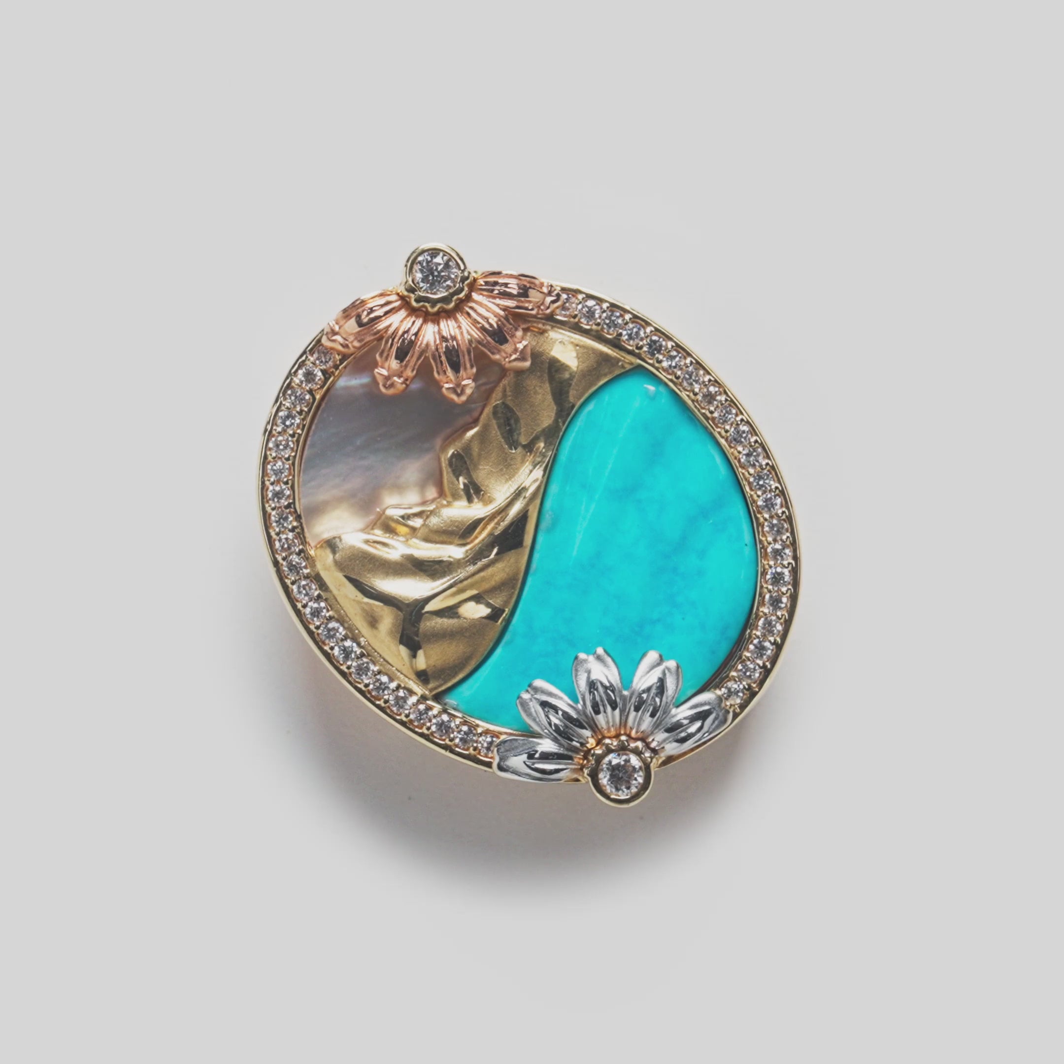 Beach & Mountain Naupaka Turquoise & Mother of Pearl Pendant in Tri Color Gold with Diamonds on white turntable