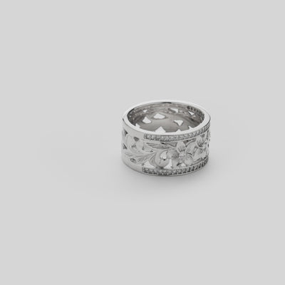 Video showcasing the Hawaiian Heirloom Plumeria Ring in White Gold with Diamonds - 10mm