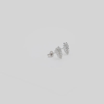 Video showcasing the 9mm Monstera Earrings in 14k White Gold