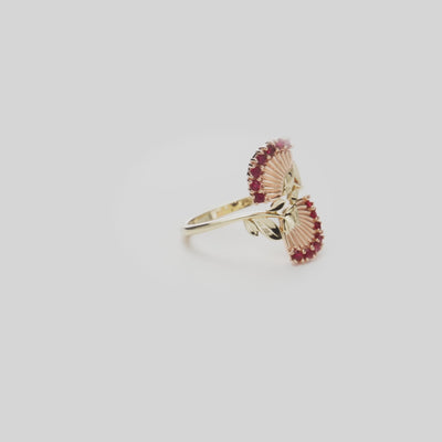 ʻŌhiʻa Lehua Ruby Ring in Two Tone Gold on a white turntable