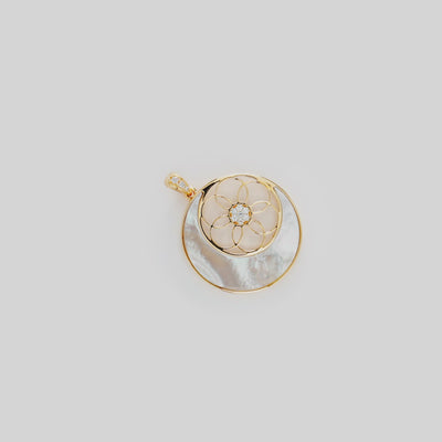 Video showcasing the Moon & Protea Star Mother of Pearl Pendant in 14k Yellow Gold with Diamonds 