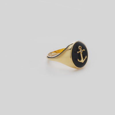 Video of Sealife Anchor Black Coral Signet Ring in Gold with Diamond on white turntable