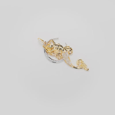 Video showcasing the Moon Mermaid Pendant in 14k White and Yellow Gold on a turn table