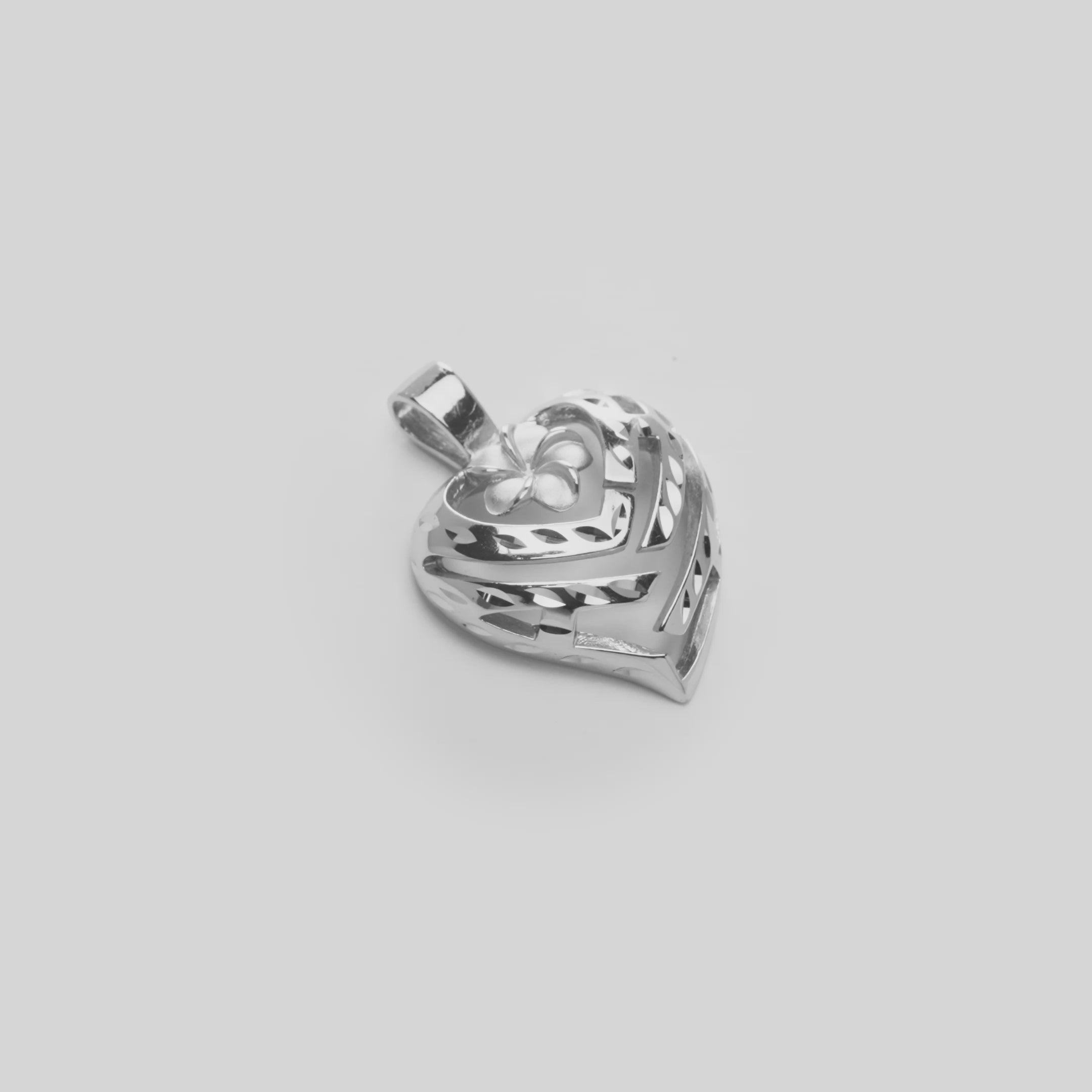 Video of the Aloha Heart Plumeria Pendant in Sterling Silver on a White turntable