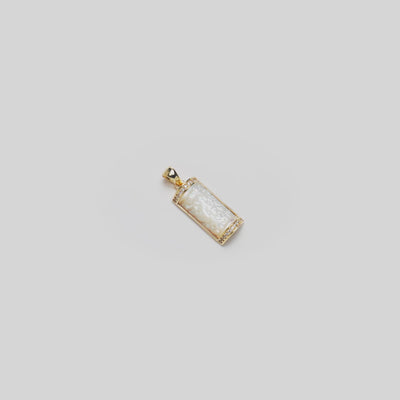 Video of the 17mm Hawaiian Heirloom Plumeria Mother of Pearl Pendant in 14k Yellow Gold turning on a white background