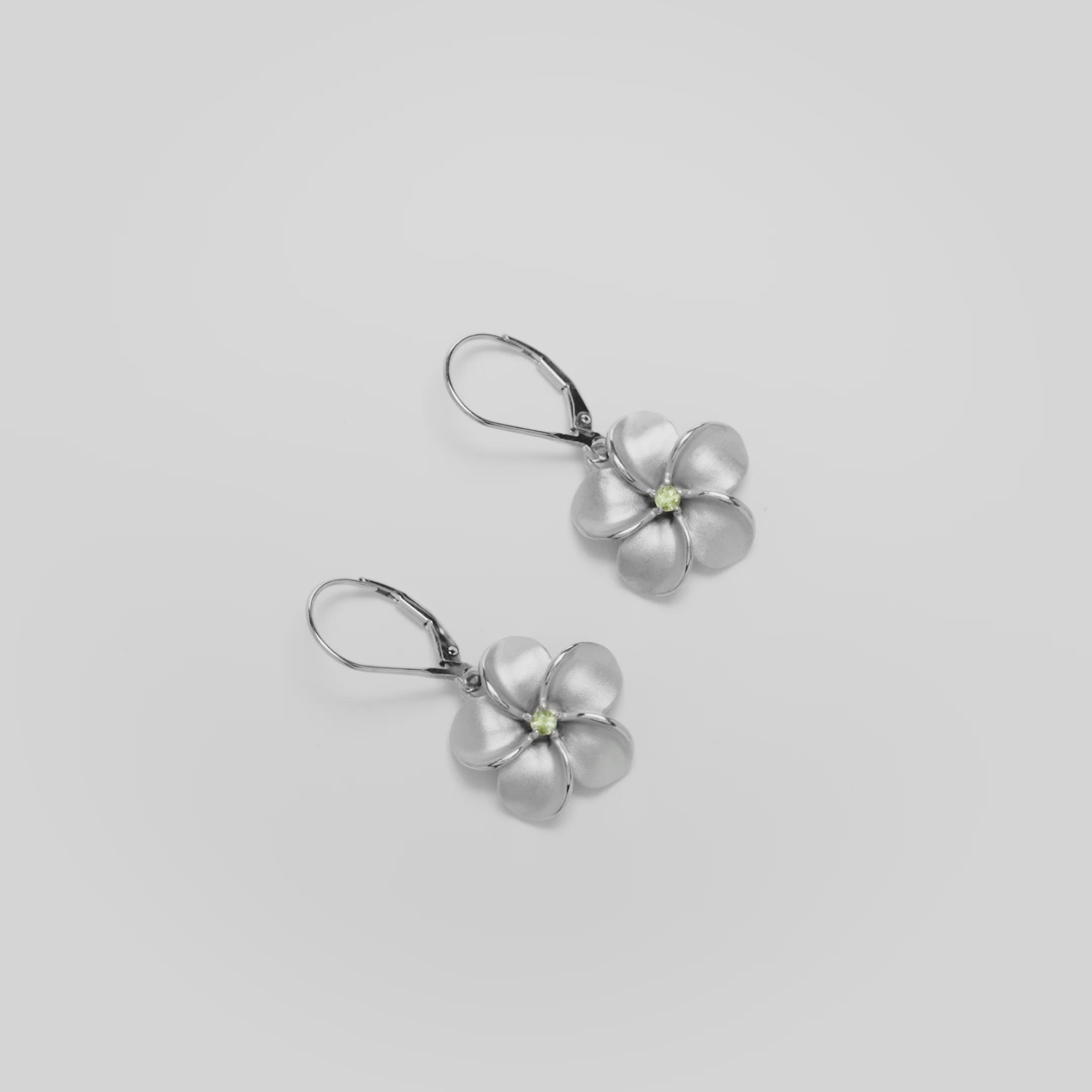 Video showcasing the Plumeria Peridot Leverback Earrings in Sterling Silver
