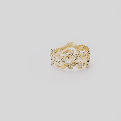 Living Heirloom Ring in Gold with Diamonds on a white turntable