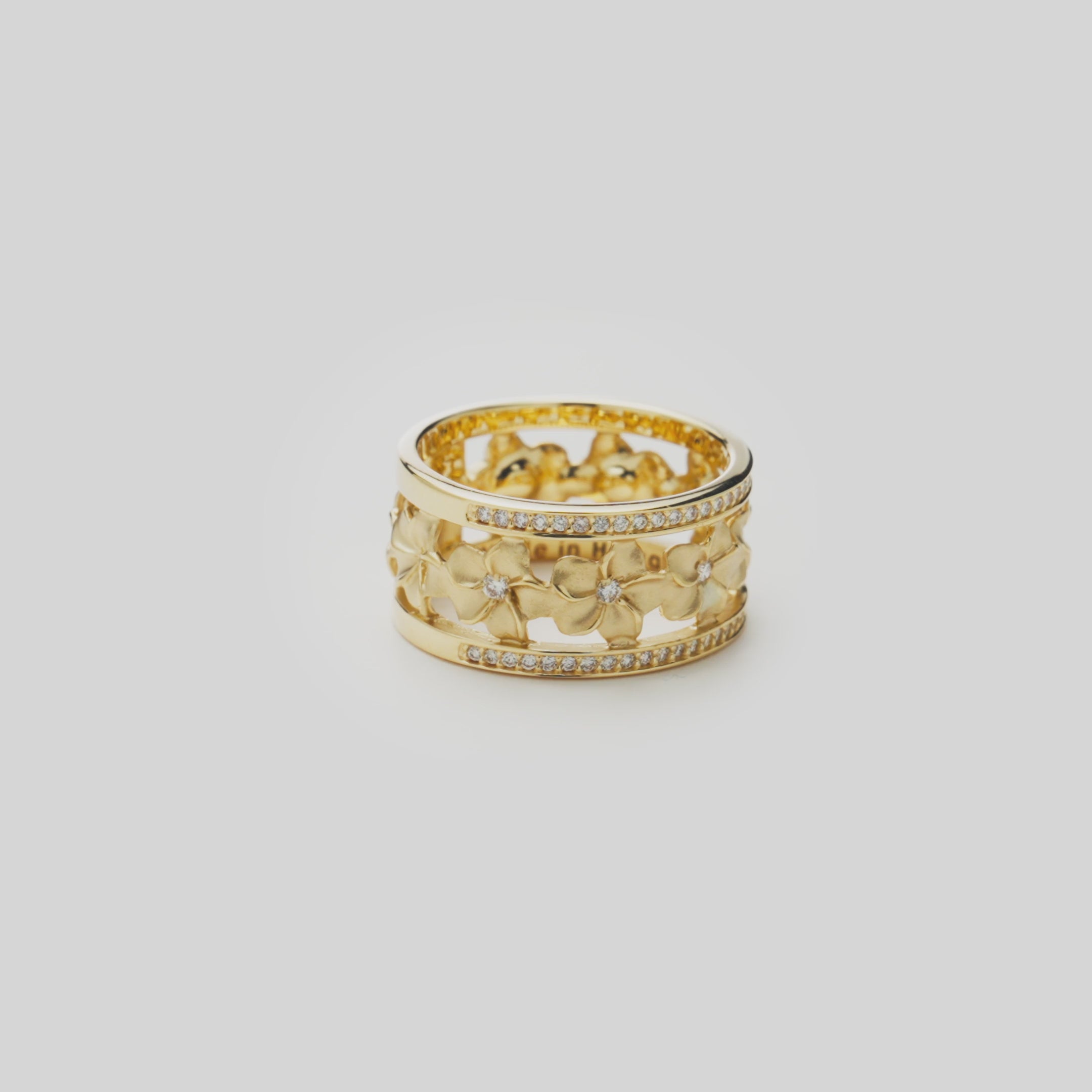 Video showcasing the Plumeria Ring in 14k Yellow Gold with Diamonds