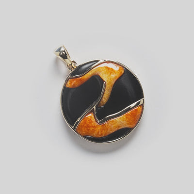 Lava Flow Black Coral and Spiny Oyster Pendant on white turntable