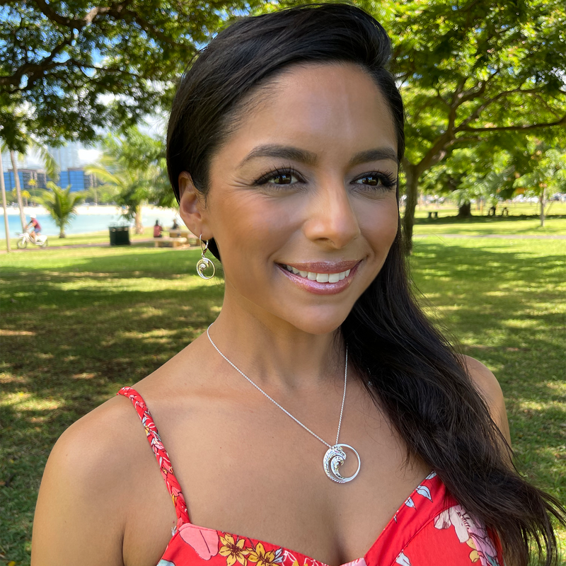 A woman wearing a Nalu Necklace in Sterling Silver - 30mm - Maui Divers Jewlery