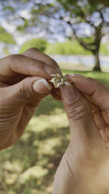 Video of a woman's hand wearing a Plumeria Ring in Gold with Diamond - 11mm-Maui Divers Jewelry