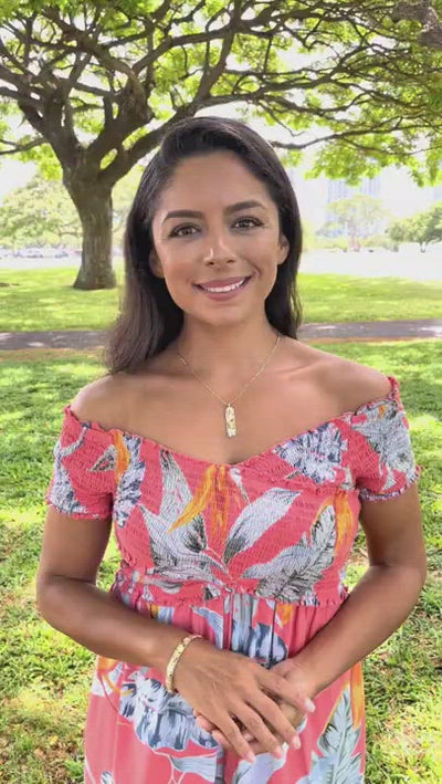 Video of a woman wearing a Hawaiian Gardens Hibiscus Pendant in Multi Color Gold with Diamonds - 39 mm - Maui Divers Jewelry