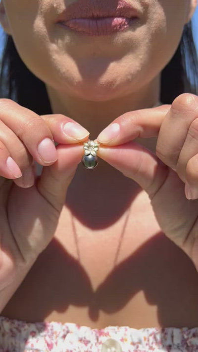 Video of a woman wearing a Plumeria (9mm) Tahitian Black Pearl Pendant in Gold with Diamond - Maui Divers Jewelry