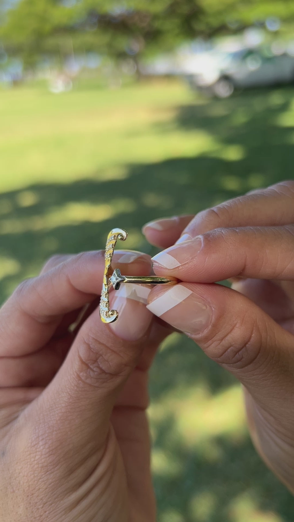 Video of a woman's hand with a Moon Mermaid Ring in Two Tone Gold with Diamonds - Maui Divers Jewelry