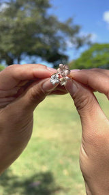 Video of a woman's hand with a Plumeria Ring in Tri Color Gold with Diamonds - Maui Divers Jewelry