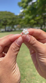 Video of a woman's hand wearing a Tiny Bubbles White Freshwater Pearl Ring in Gold with Diamonds - Maui Divers Jewelry
