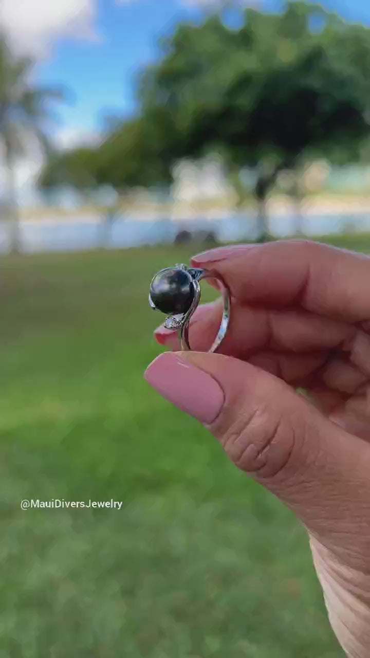 Video of a woman's hand wearing a Tahitian Black Pearl Ring with Diamonds in 14K White Gold (9-10mm)-Maui Divers Jewelry