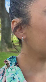 Video of a woman wearing the Heritage Earrings in White Gold with Diamonds - 13mm - Maui Divers Jewelry