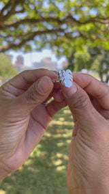 Video of a woman's hand wearing a Monstera Ring in White Gold - 15mm - Maui Divers Jewelry